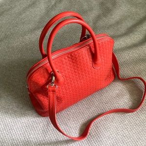 Bright orange/red leather woven bag